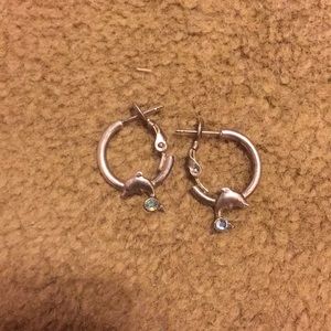 Used tarnished small dolphin hoops